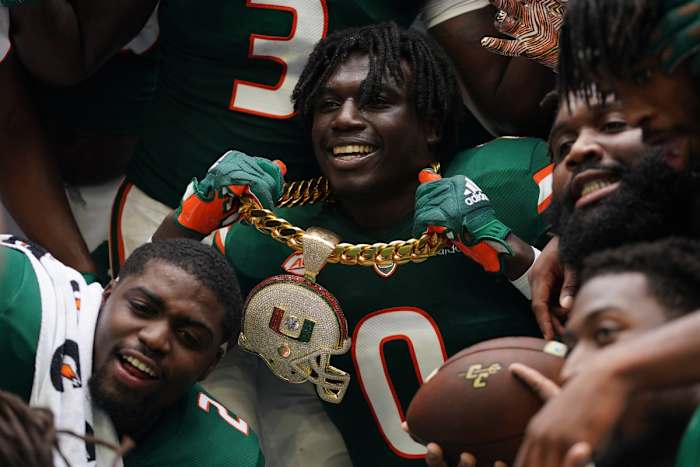 Miami players display their "Turnover Chain" during the 2021 game against Central Connecticut State. (Jason Vinlove/USA Today Sports)